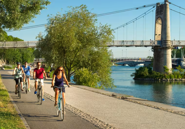 Cycling along the banks of the Rhône in Lyon